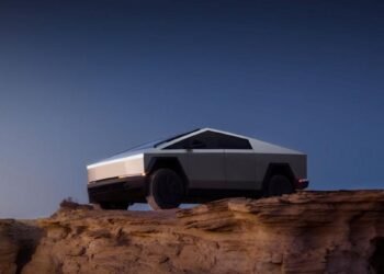 Imagem promocional da Tesla com veículo elétrico